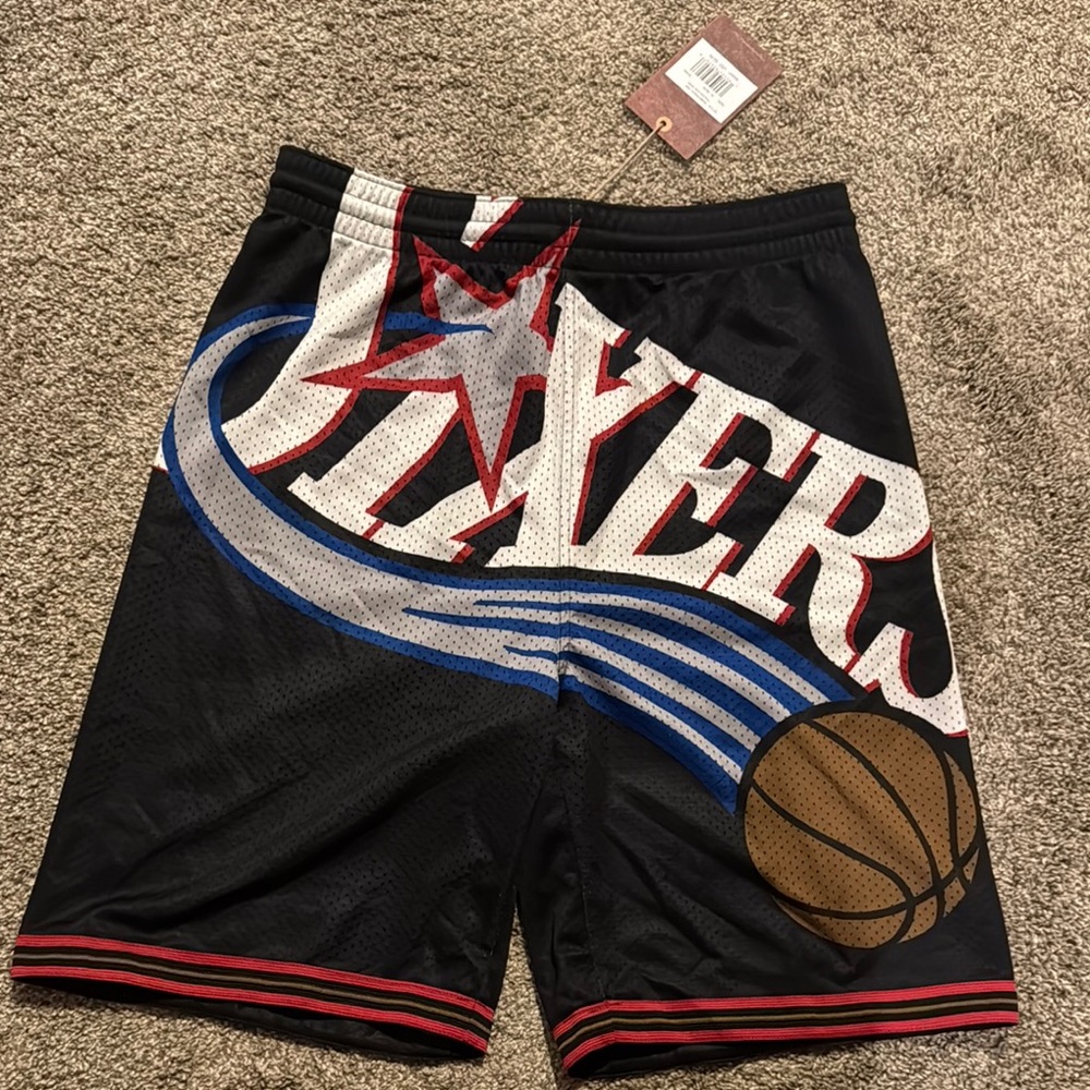 Black and Blue Athletic Shorts with Bold Sixers Design